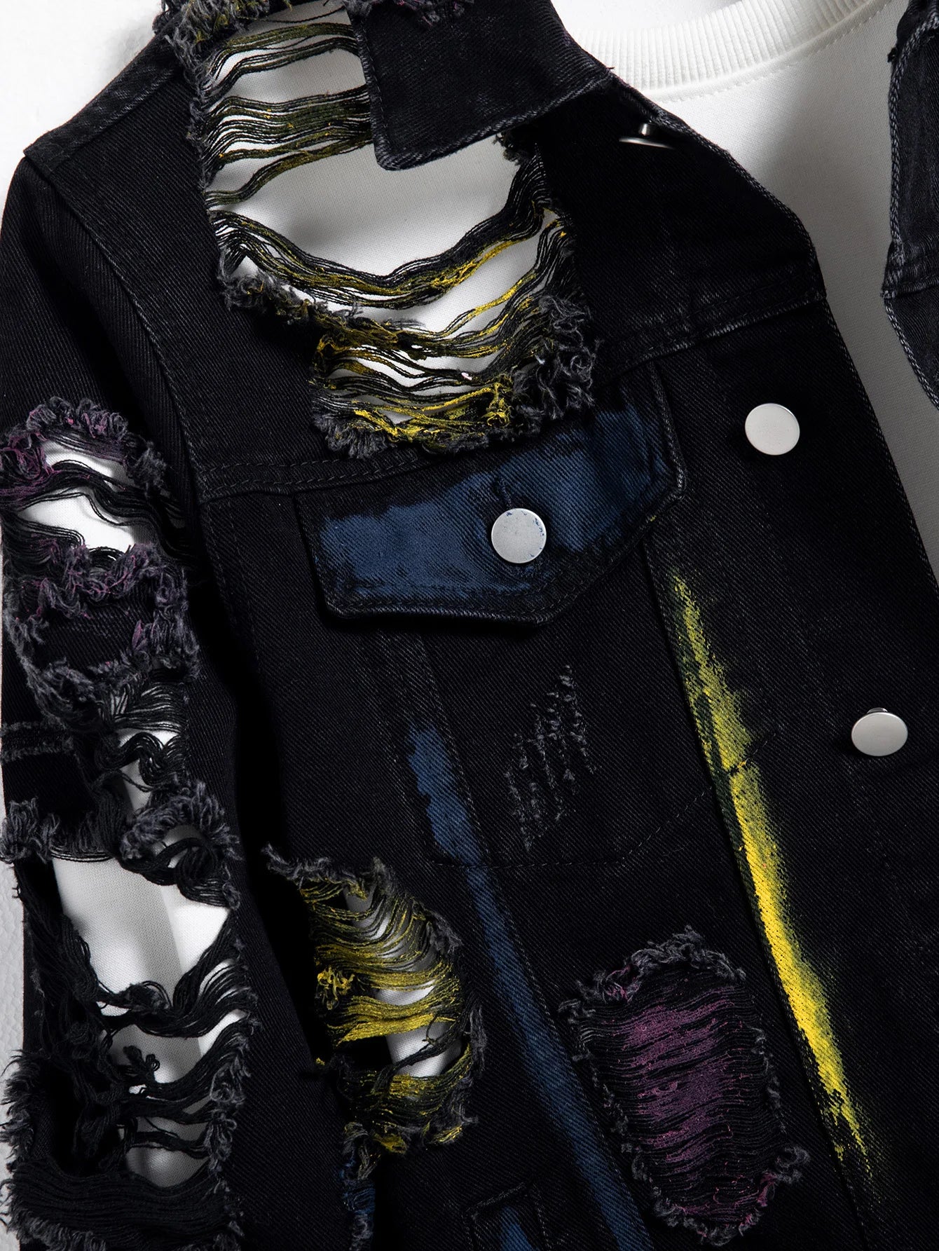 Men's black ripped denim jacket w/ Random paint splashing.
