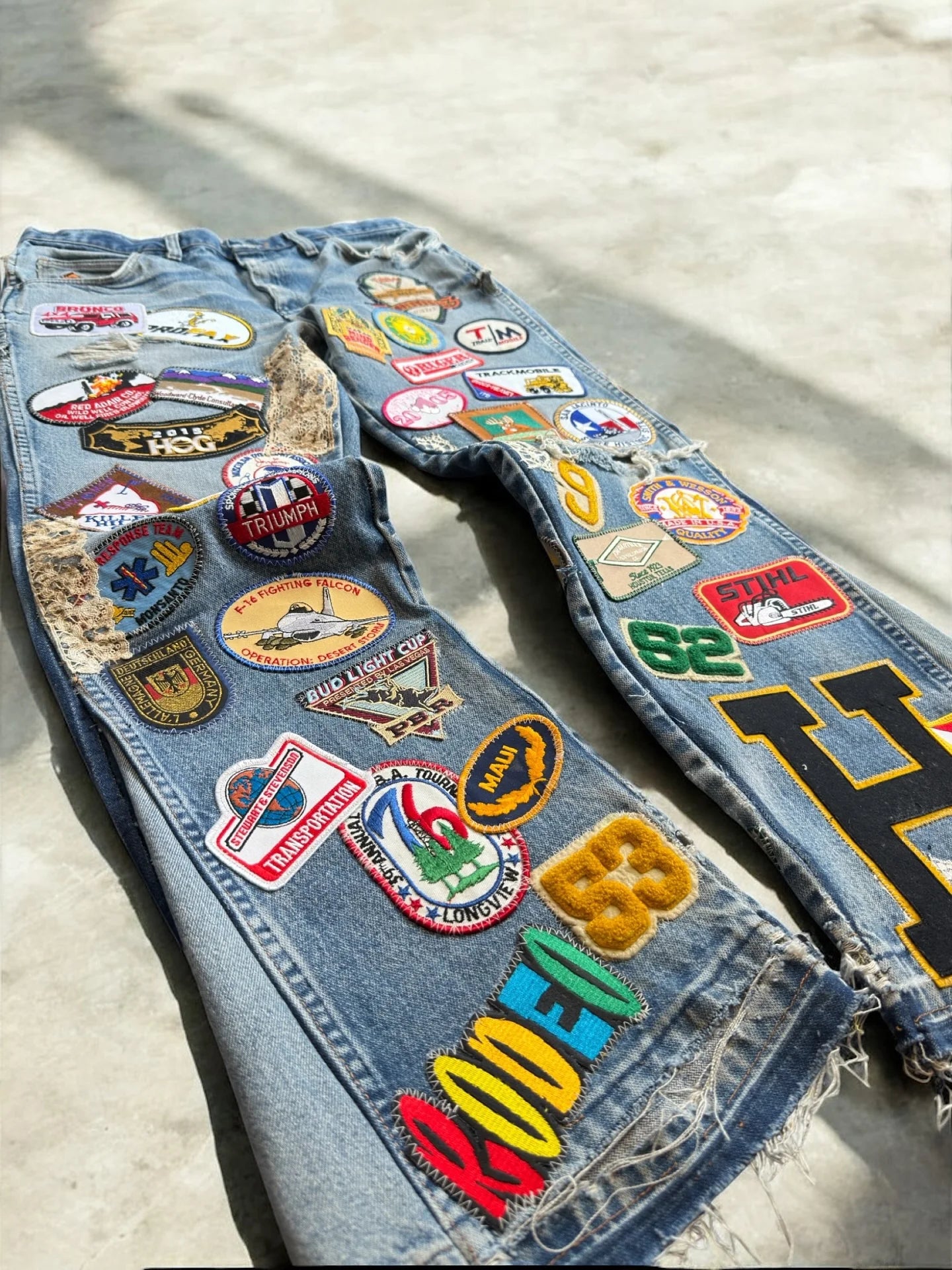 American Vintage Y2K Multi Patch Jeans Mens Womens Blue Distressed Bell Bottom Patch Embroidered Logo Pattern Baggy Trousers