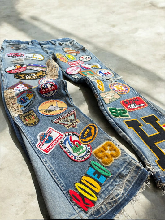 American Vintage Y2K Multi Patch Jeans Mens Womens Blue Distressed Bell Bottom Patch Embroidered Logo Pattern Baggy Trousers