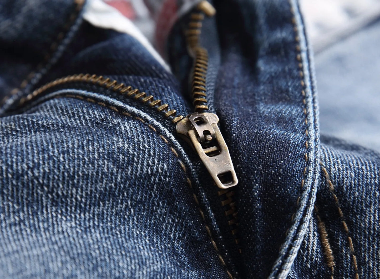 European and American process washed personalized embroidered with badges elastic jeans